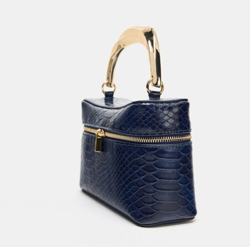 32 EMBOSSED VANITY