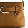 38 Shoulder bag with decorative strap